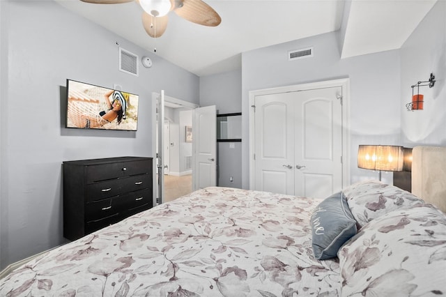 bedroom with ceiling fan and a closet