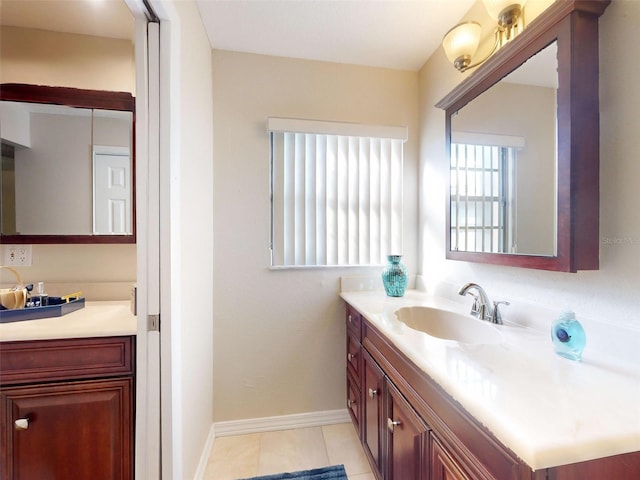 bathroom featuring tile patterned floors and vanity