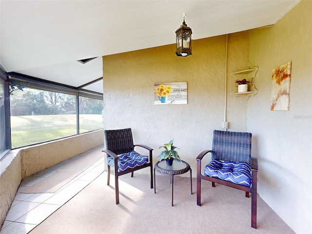 sunroom / solarium with lofted ceiling