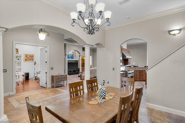 dining area with ornate columns, visible vents, arched walkways, and ornamental molding