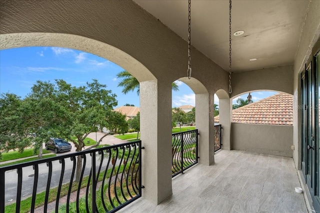 view of patio / terrace with a balcony