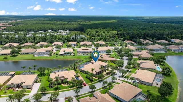 aerial view with a residential view and a water view