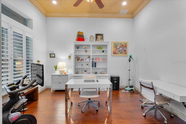 office featuring dark wood-type flooring, visible vents, ornamental molding, and baseboards