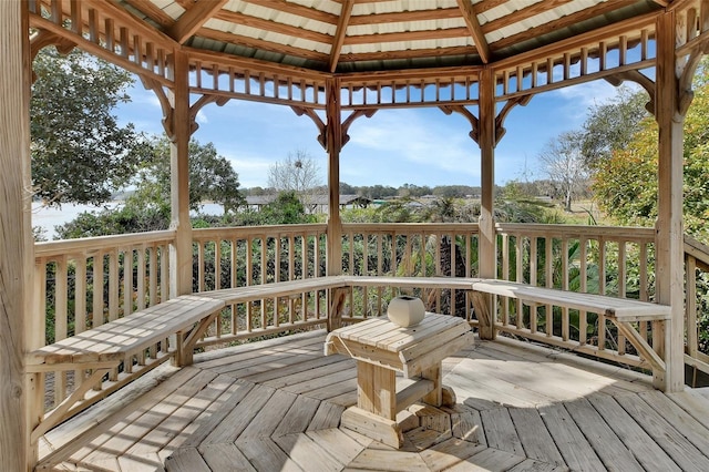 wooden terrace with a gazebo