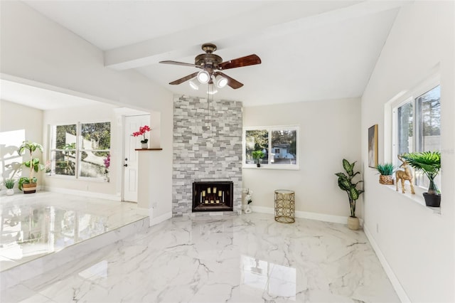 unfurnished living room featuring a stone fireplace, ceiling fan, and lofted ceiling with beams