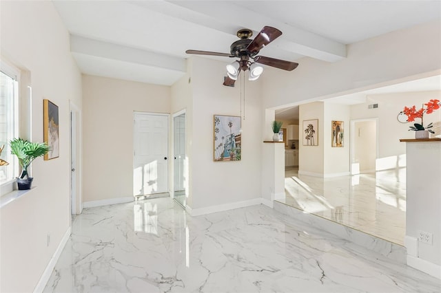 unfurnished room with beam ceiling and ceiling fan