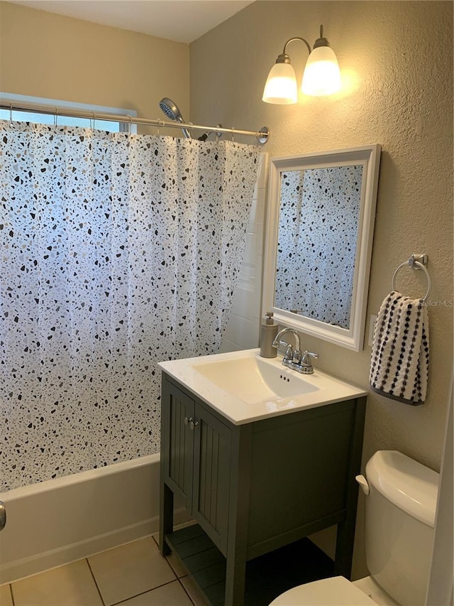 full bathroom featuring tile patterned flooring, vanity, toilet, and shower / bathtub combination with curtain