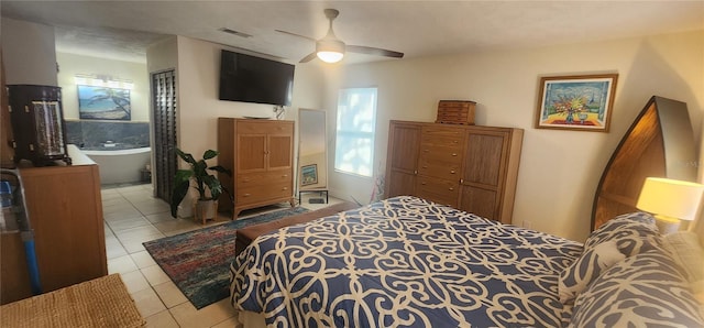 bedroom featuring ceiling fan and light tile patterned floors