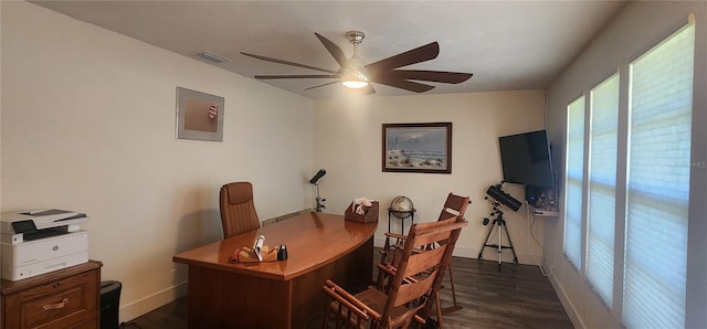 office space featuring dark hardwood / wood-style flooring and ceiling fan