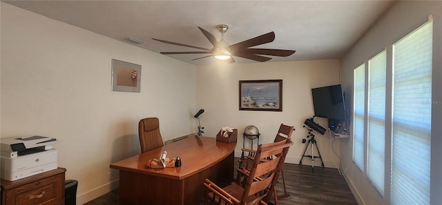 office featuring dark hardwood / wood-style floors and ceiling fan