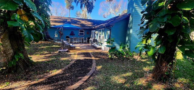 exterior space with a patio area