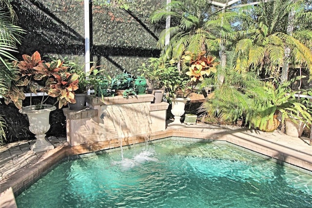 view of pool featuring pool water feature