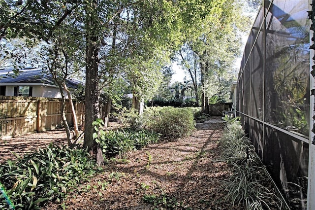 view of yard featuring a lanai