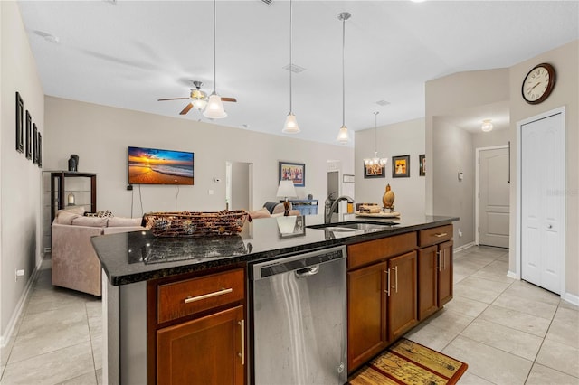 kitchen with ceiling fan, sink, hanging light fixtures, stainless steel dishwasher, and a center island with sink