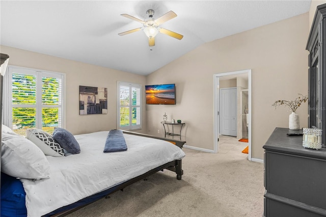 bedroom featuring ceiling fan, light carpet, and vaulted ceiling