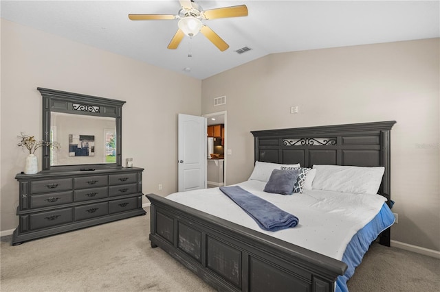 carpeted bedroom featuring ceiling fan and vaulted ceiling