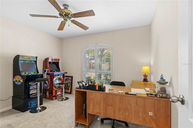 home office with carpet flooring and ceiling fan