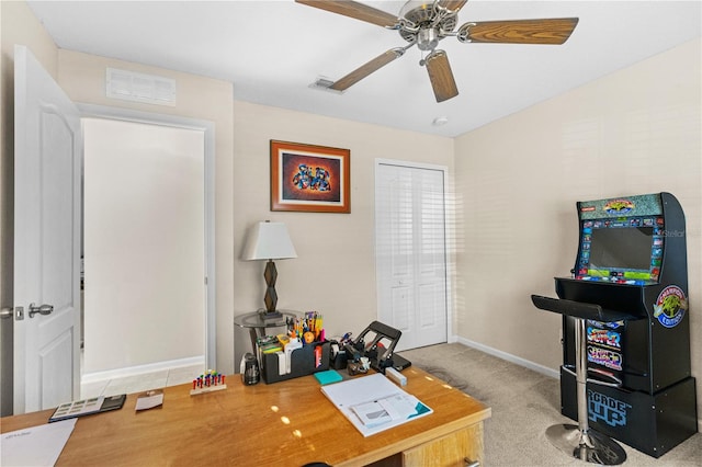 home office with carpet flooring and ceiling fan