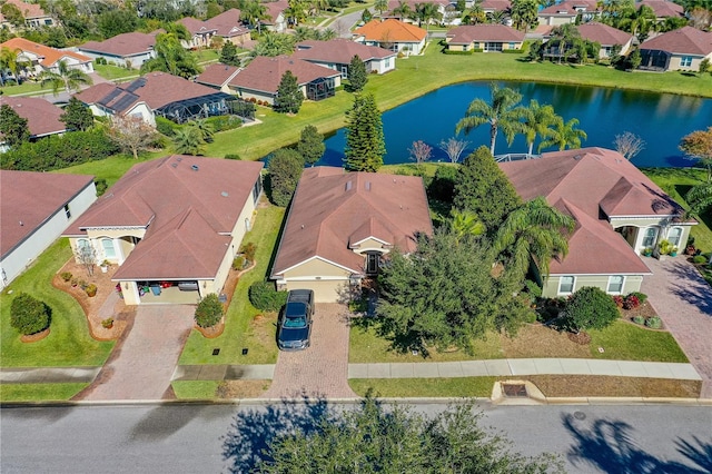 bird's eye view with a water view