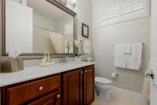 bathroom with vanity, toilet, tile patterned floors, and curtained shower