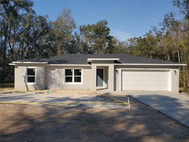 view of front of property featuring a garage