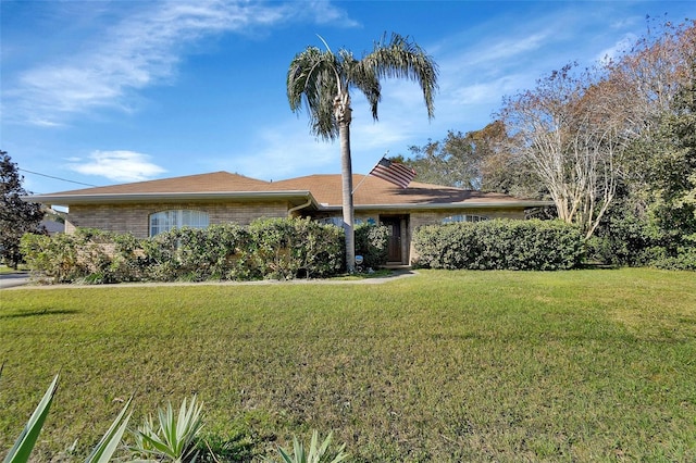 view of front of home with a front yard