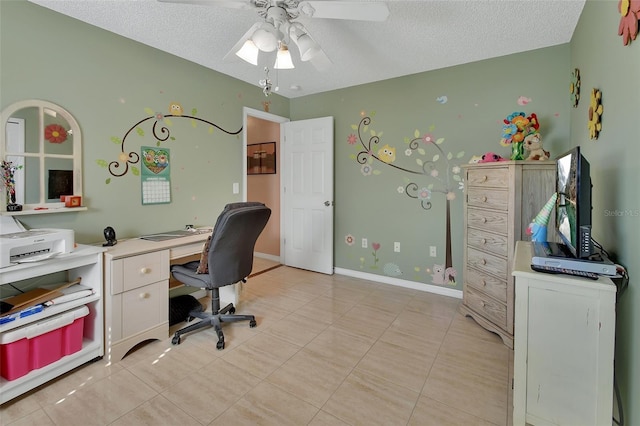 office area with ceiling fan and a textured ceiling