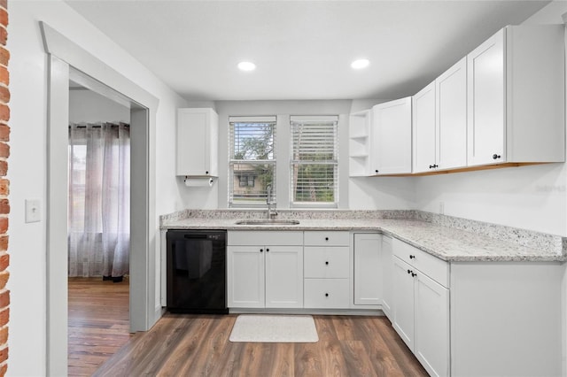 kitchen featuring dishwasher, dark hardwood / wood-style floors, white cabinetry, and sink