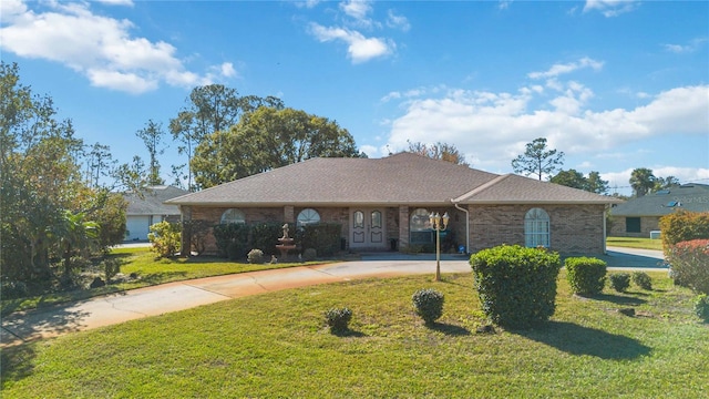 ranch-style house with a front lawn