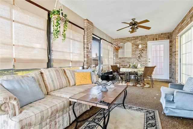 sunroom with ceiling fan