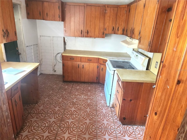 kitchen with white range with electric stovetop and extractor fan