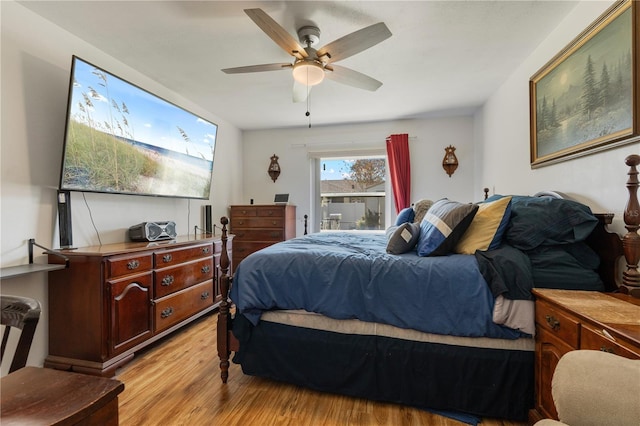 bedroom featuring light hardwood / wood-style flooring and ceiling fan