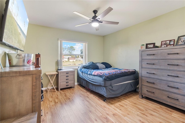 bedroom featuring ceiling fan and light hardwood / wood-style flooring