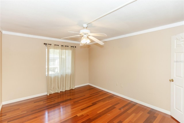 spare room with ceiling fan, wood-type flooring, and ornamental molding