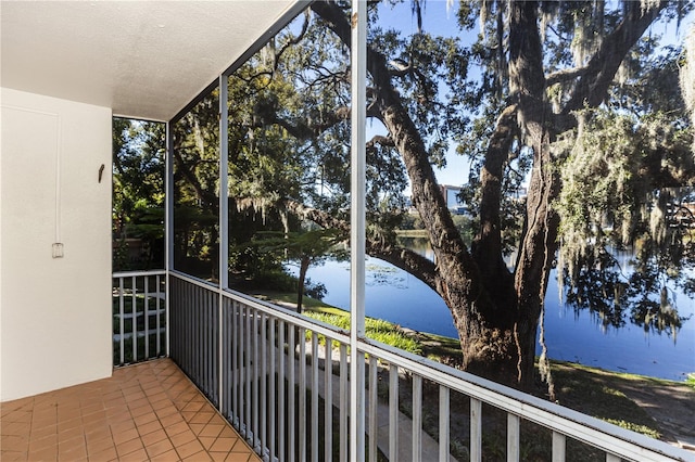 balcony featuring a water view