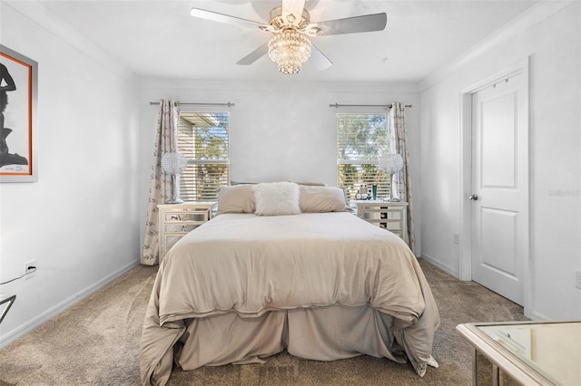 bedroom featuring carpet flooring, multiple windows, ceiling fan, and crown molding