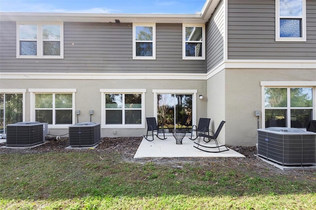 back of house featuring a patio and central AC