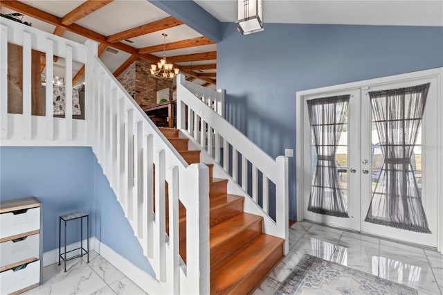 stairs with french doors, a notable chandelier, and beam ceiling