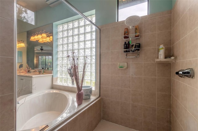 bathroom featuring vanity and plus walk in shower