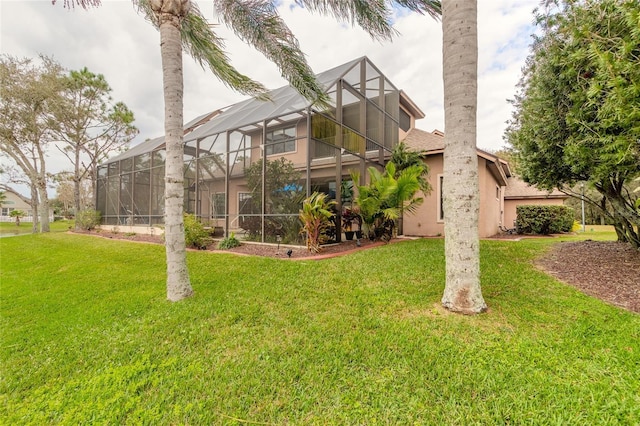 view of yard with a lanai