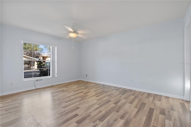 unfurnished room featuring ceiling fan and light hardwood / wood-style floors