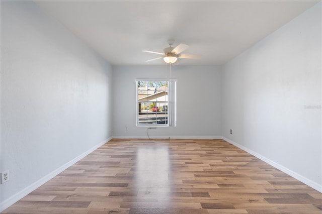 unfurnished room featuring ceiling fan and light hardwood / wood-style floors