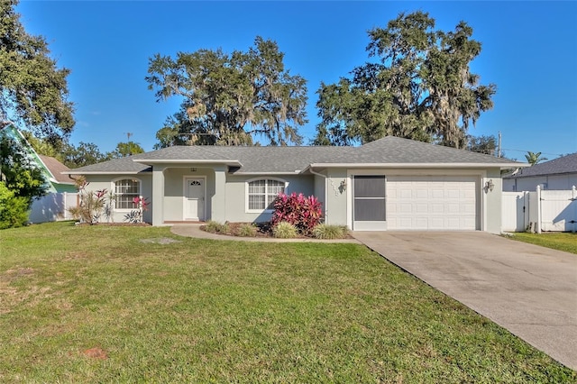 single story home with a front lawn and a garage