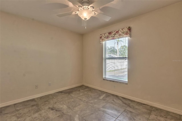 unfurnished room with ceiling fan