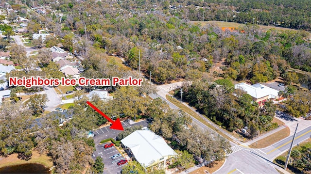 bird's eye view featuring a view of trees