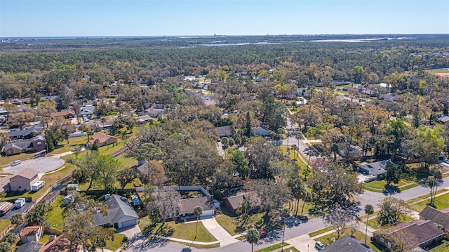 bird's eye view with a residential view and a view of trees