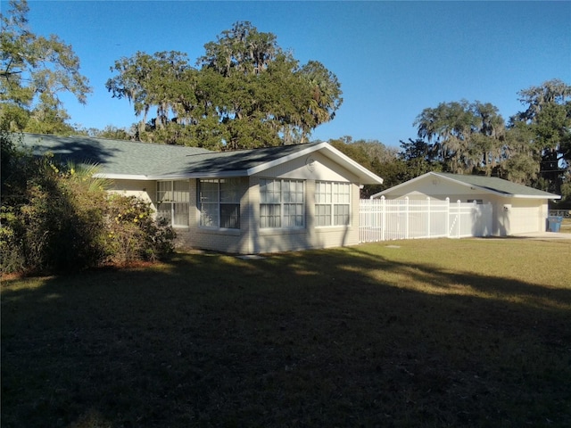 view of home's exterior featuring a lawn