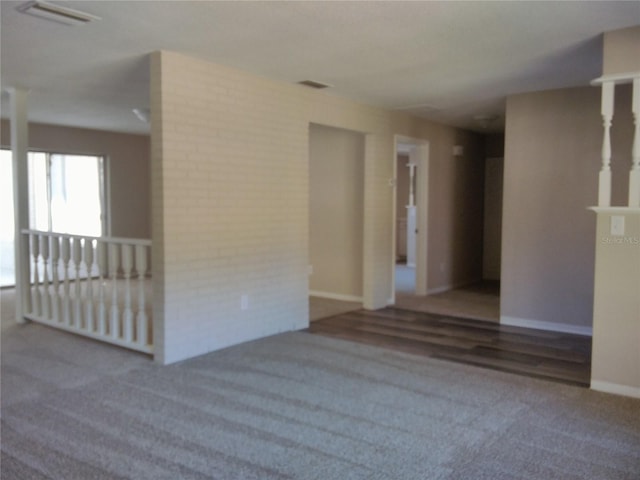 empty room with carpet flooring