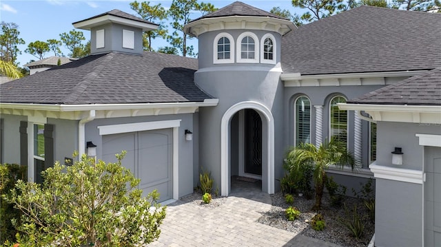 view of front of home with a garage