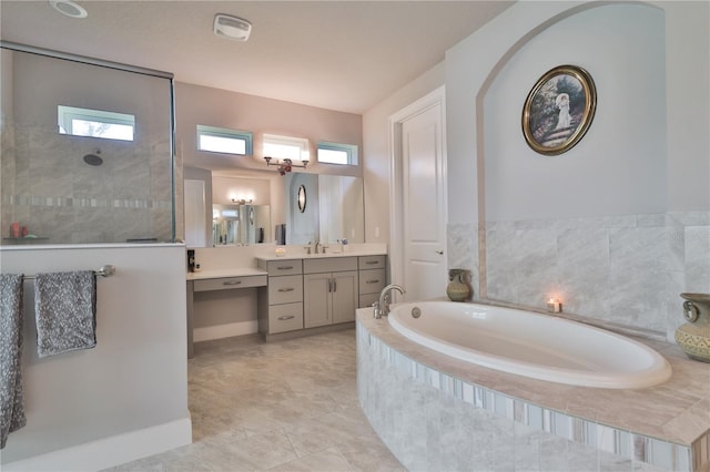 bathroom with shower with separate bathtub, vanity, tile patterned floors, and a healthy amount of sunlight